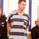 Former University of Cincinnati Police Officer Ray Tensing enters Hamilton County Common Pleas Court to be arraigned on murder charges July 30, 2015, in Cincinnati. Tensing pleaded not guilty in the shooting death of Sam Dubose during a routine traffic stop July 19. Bond was set at $1 million.
Mark Lyons/Getty Images